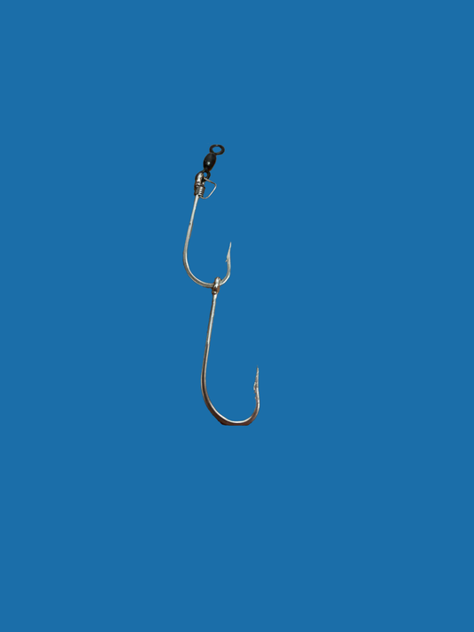A double hook fishing lure with a swivel and monel pin-rig against a blue background.