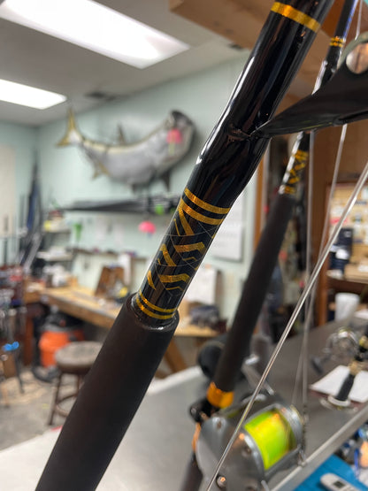 black and gold fishing pole Shimano Tyrnos 50 II on Black Hook 6' Stand-Up Rod Combo