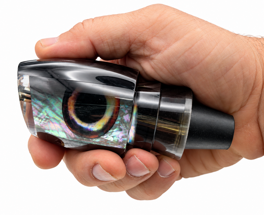 Andy’s Boy L Black Back / Light Smoke Bottom with White MOP insert shown in hand from side view