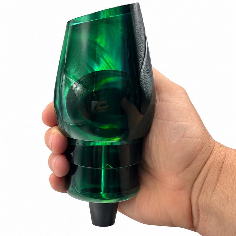Load image into Gallery viewer, Bottom view of Andy’s Not a Sumo Black/Green Back Neon Green Bottom offshore trolling lure head with White MOP shown in hand
