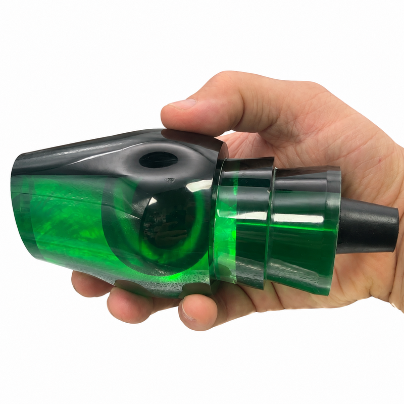 Load image into Gallery viewer, Andy’s Not a Sumo Black Green Back Neon Green Bottom trolling lure head with White MOP shown in hand for size reference
