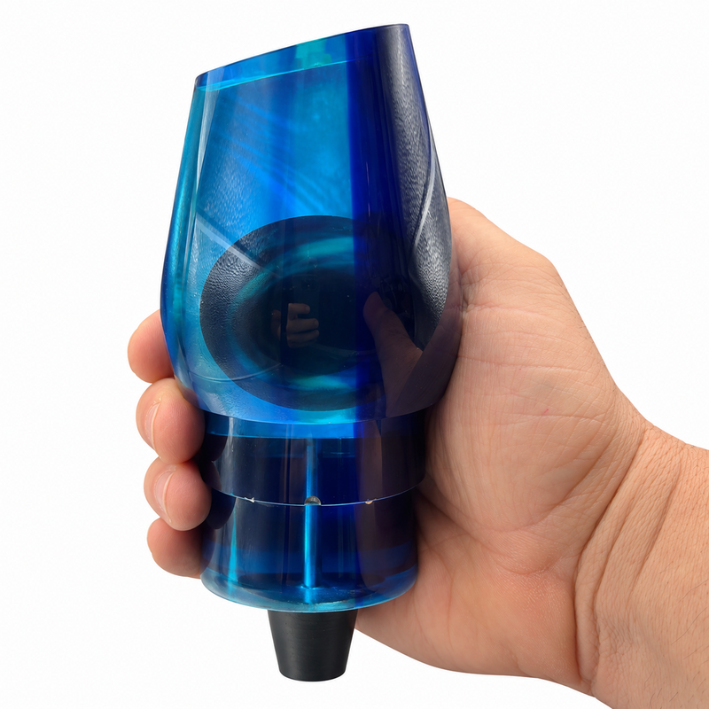 Load image into Gallery viewer, Bottom view of Andy’s Not a Sumo Blue Back Bermuda Blue Bottom offshore trolling lure head with White MOP insert shown in hand
