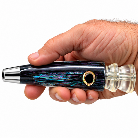 LMR Wahoo Trolling Dart black abalone lure head shown in hand for size reference