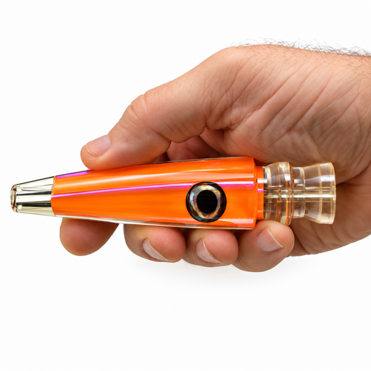 LMR Wahoo Trolling Dart Orange Crush 5 oz lure head shown in hand for size reference