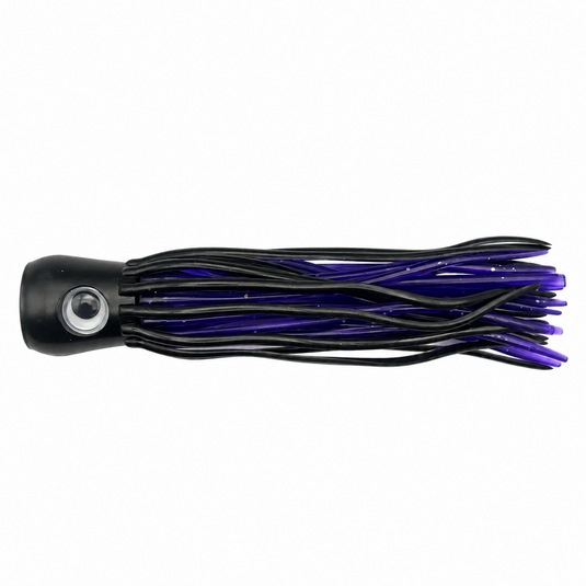 Mold Craft Little Super Chugger 5.5 inch Black/Purple trolling lure with black head, large eye and black-and-purple skirt, side view on white background.