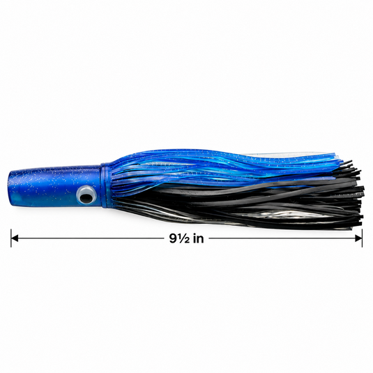 Mold Craft Standard Wide Range 9½-inch Blue Black trolling lure featuring a glitter blue head and blue, black and silver skirt, side view with overall length measurement on white background.